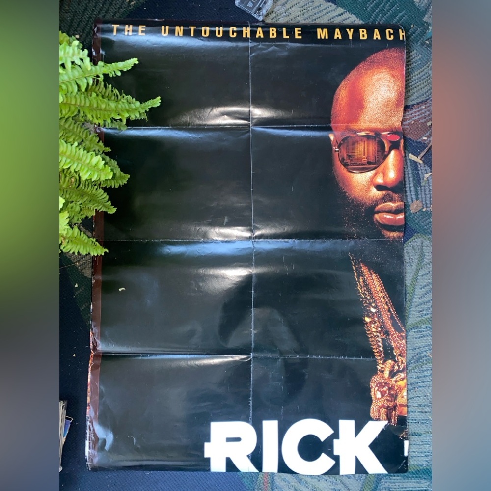 Rick ross Maybach empire poster used 
Split in half 
Poor condition